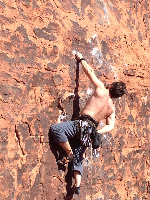 rock climber on side of mountain