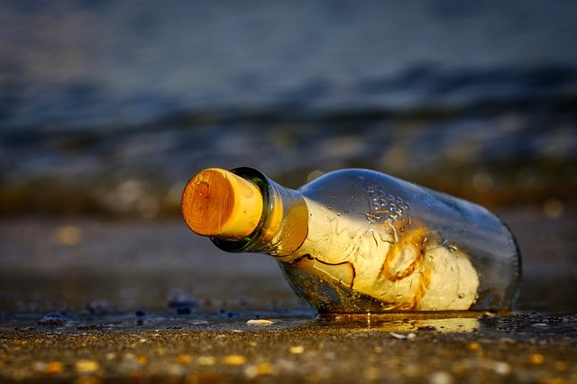 message in a bottle on the beach