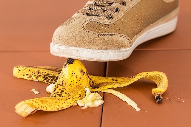 Person about to step on banana peel. 