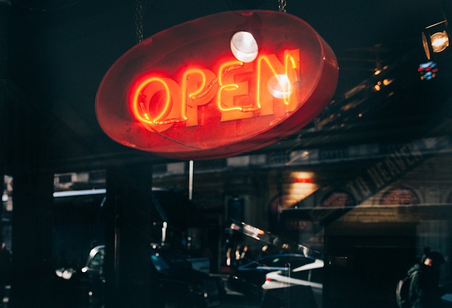 Neon 'Open' sign at night. 