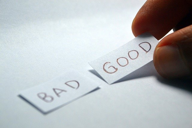 Person picking a 'good' paper instead of 'bad'