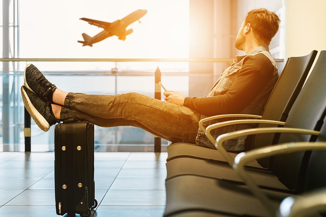 Person waiting at airport. 